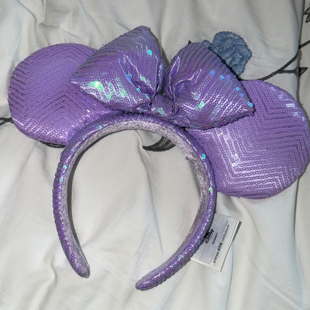 Disney Lavender Minnie Ears Headband with turquoise light reflecting sequins